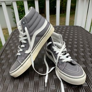 Gray and White High Top Vans